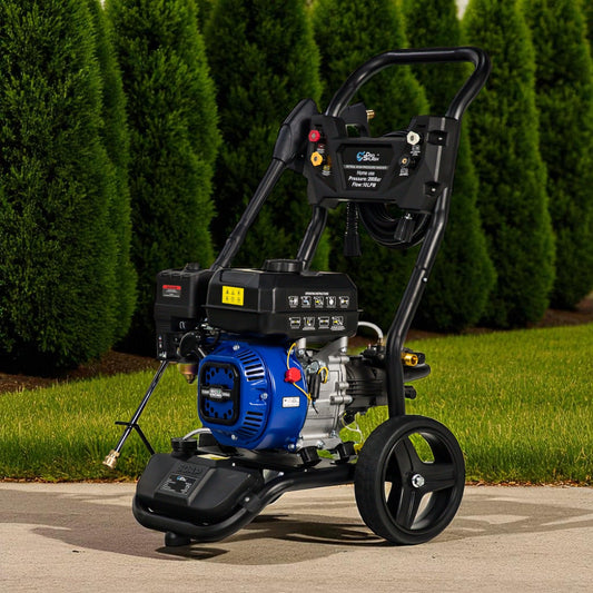Pressure washer on a driveway with greenery in the background